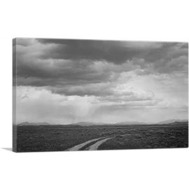 Roadway and Clouded Sky Near Grand Teton National Park - Wyoming
