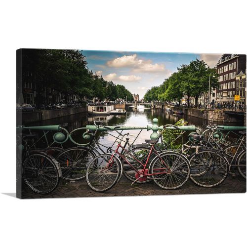 Bikes on a Bridge Canal of Amsterdam Netherlands